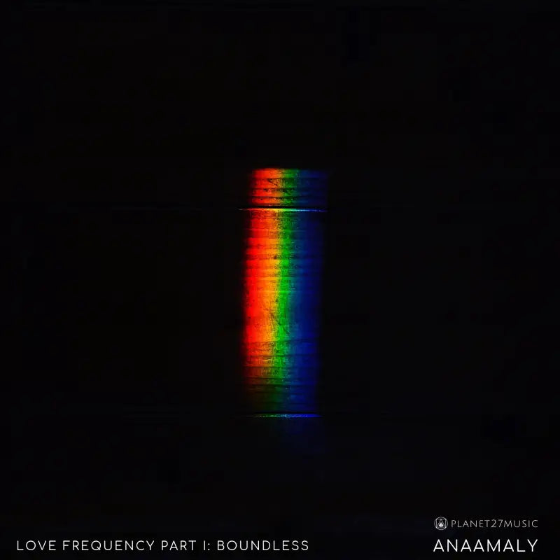 Vertical rainbow spectrum on dark background creates a peaceful backdrop for Boundless